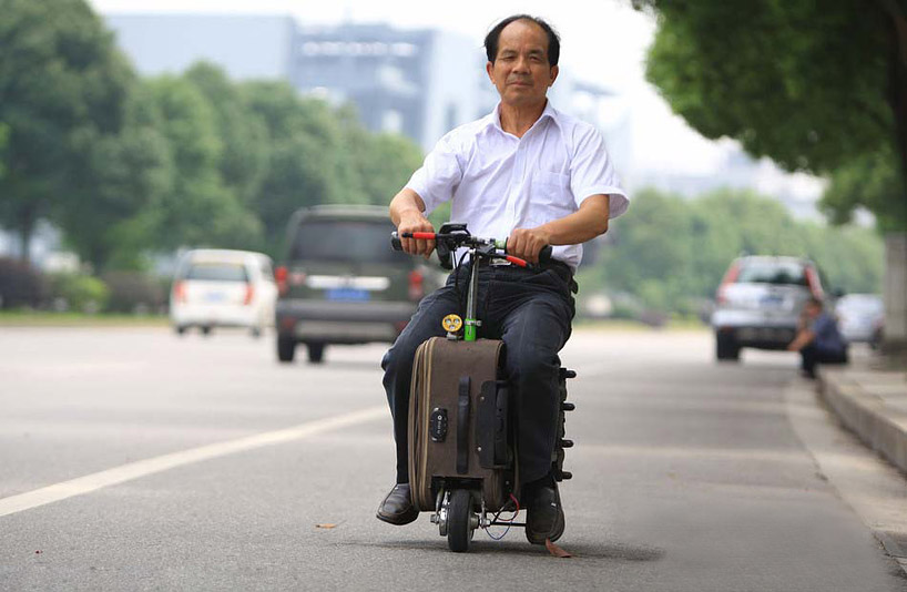chinese-farmer-builds-a-fully-functioning-suitcase-scooter