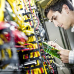 Technician Working on Network