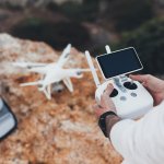 drone pilot photographer prepares launch flight