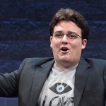 1200px-Palmer_Luckey_holding_up_Oculus_Touch_prototype_(June_11,_2015)