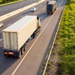 Top view of White Truck motion blur on highway road with container, transportation concept.,import,export logistic industrial Transporting Land transport on the expressway.soft focus