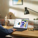 Young,Handsome,Man,Working,From,Home,On,Laptop,Computer,With