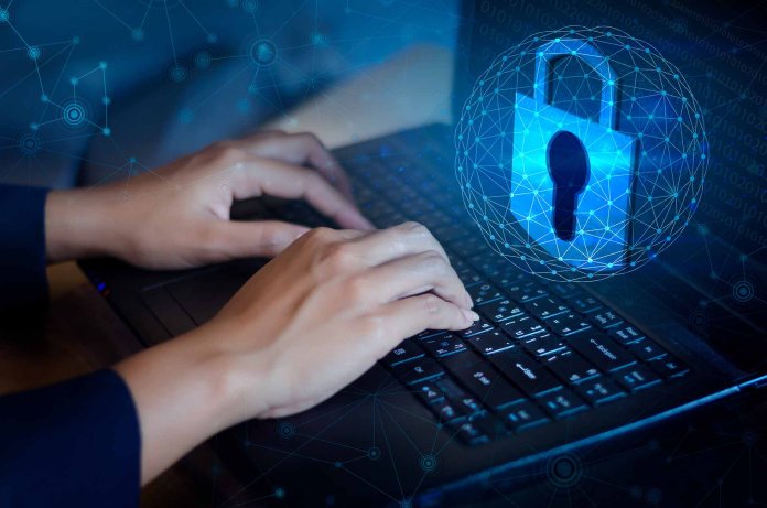 Press enter button on the computer. Key lock security system abstract technology world digital link cyber security on hi tech Dark blue background, Enter password to log in. lock finger Keyboard