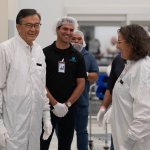Intel CEO Lip-Bu Tan gowns up in a clean room bunny suit inside Fab 52 in Chandler